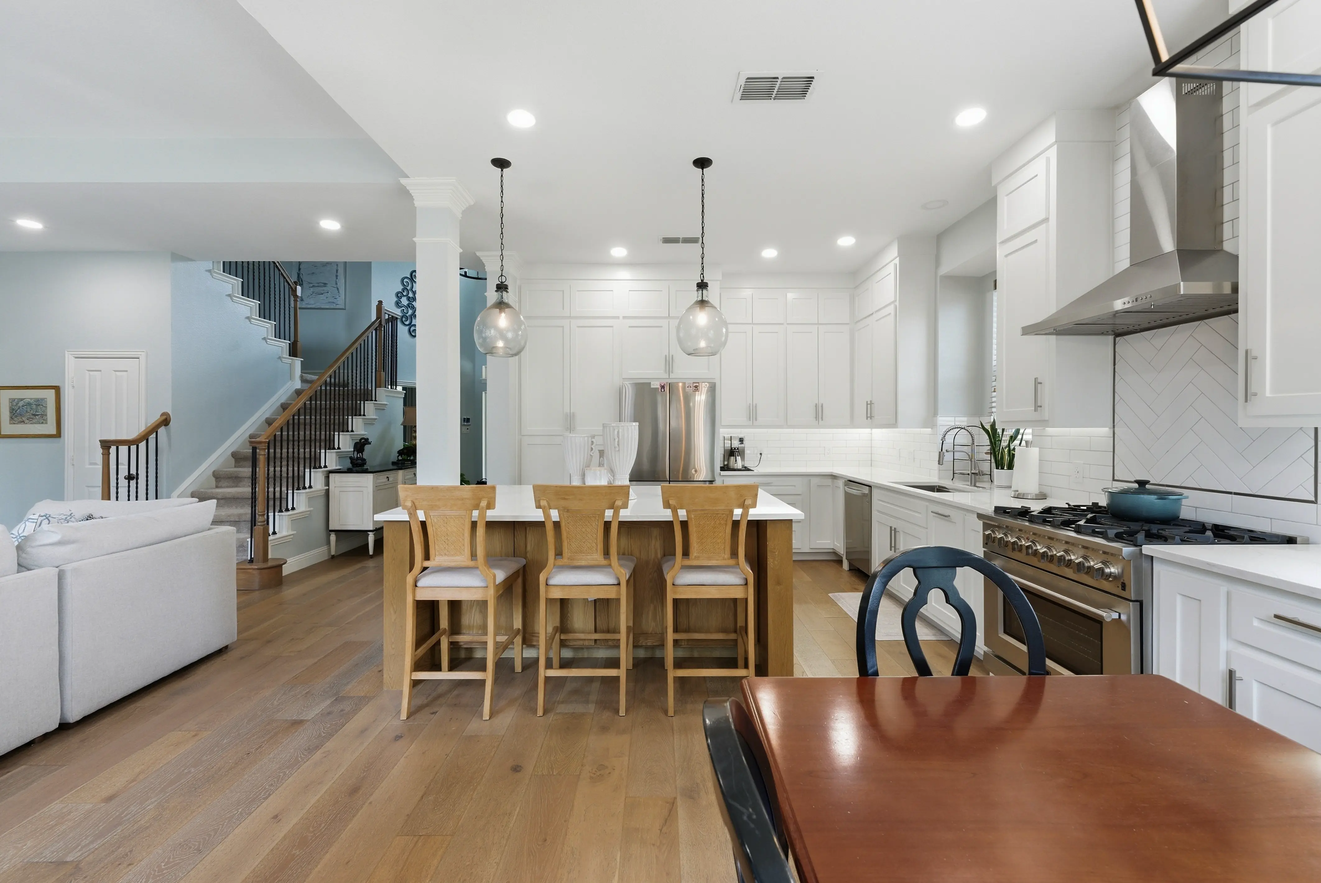 Kitchen with quartz counters and island